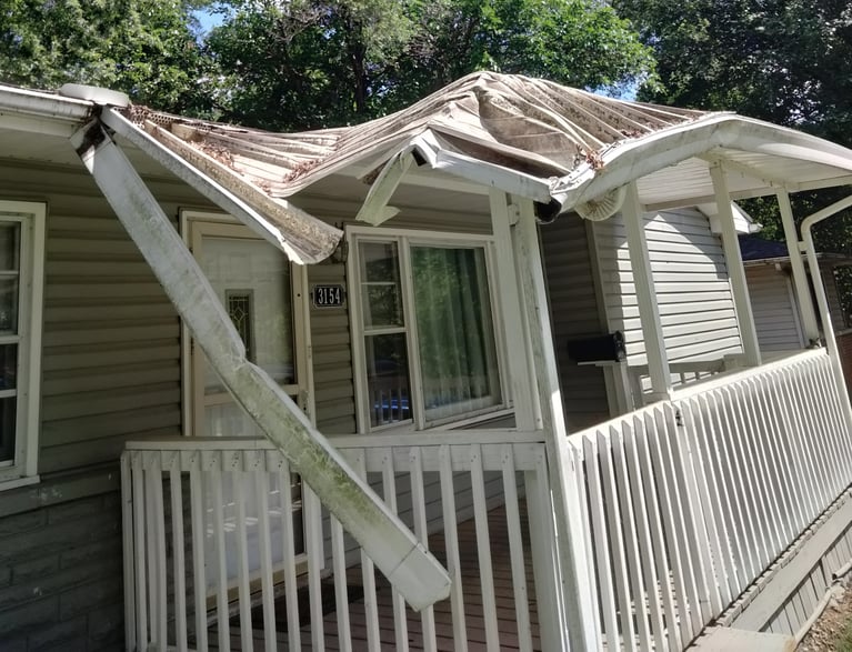 Damaged rooftop repair before picture