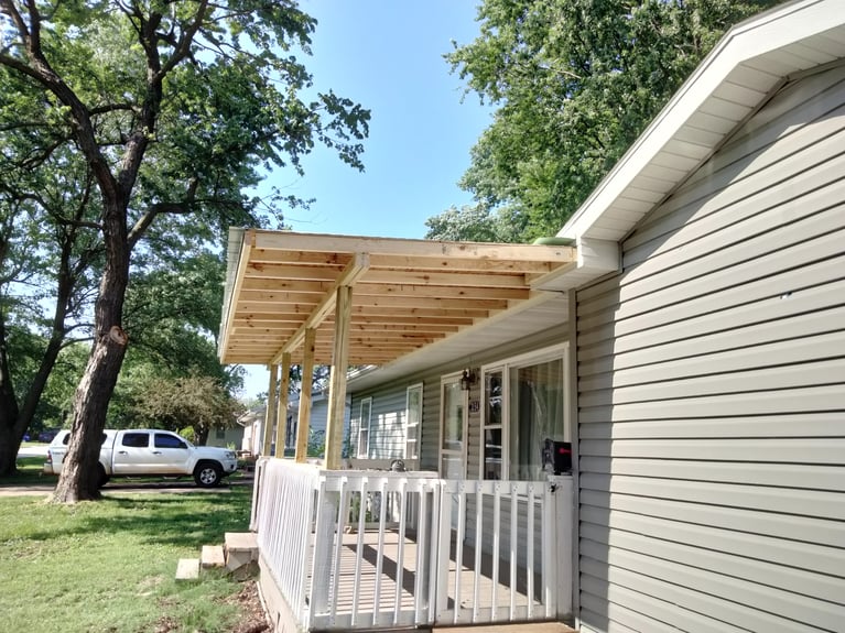 Damaged rooftop repair after picture